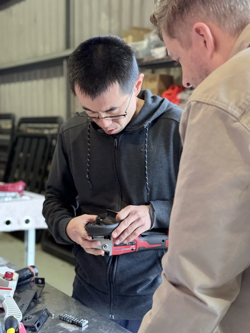 Minyi Lee, owner of Canetoad Equipment, and Torsten Schmidt of Vendos checking the quality of new products at the Canetoad warehouse